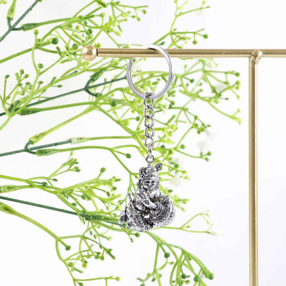 Premium Silver-finish Metal Bal Krishna Eating Makhan Keychain (1 Pc)