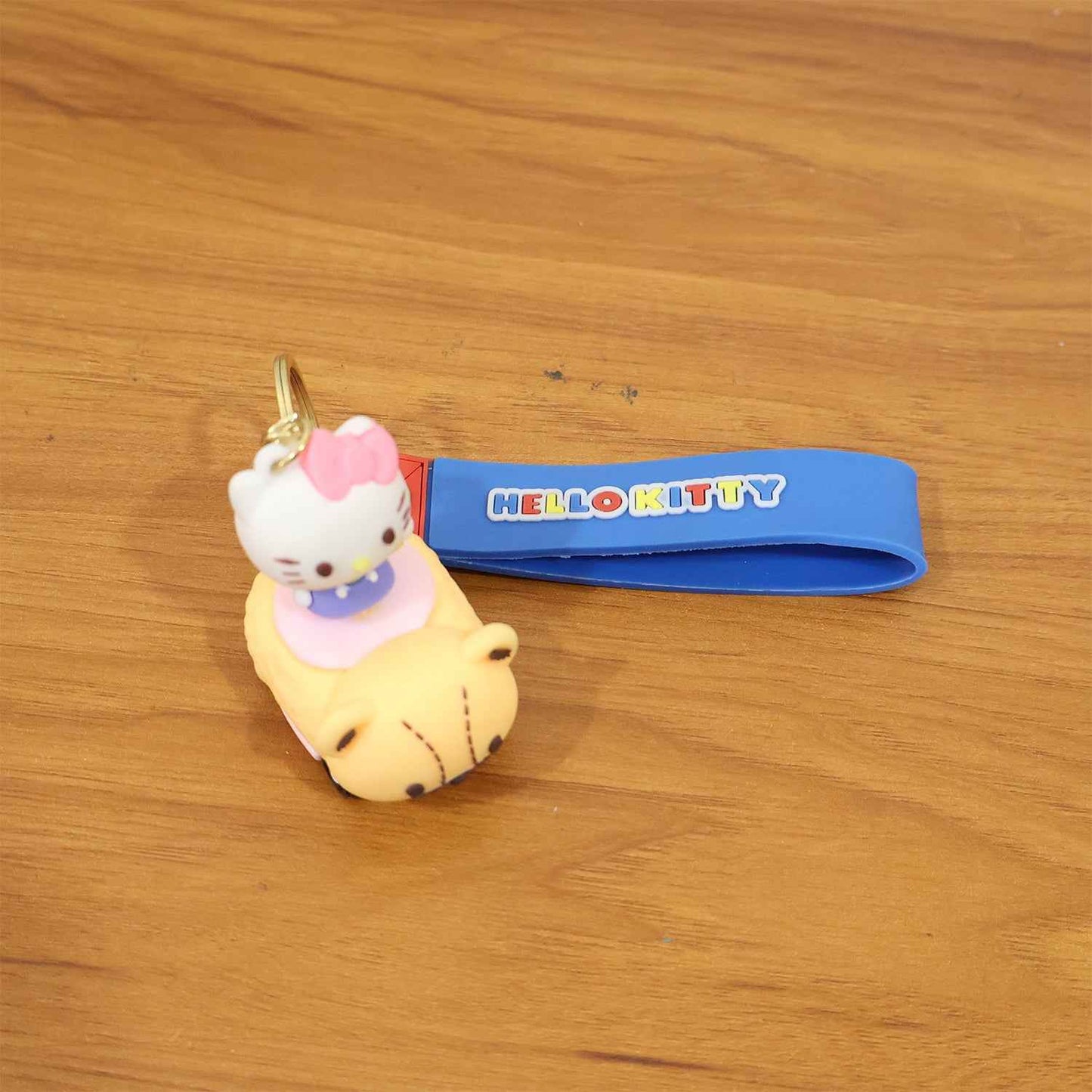 Cute Cartoon Cat Riding Toy Car Silicone Keychain (1 Pc)