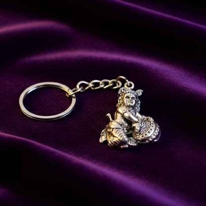 Premium Silver-finish Metal Bal Krishna Eating Makhan Keychain (1 Pc)